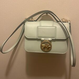 Used Longchamp box-trot crossbody bag
Color-teal